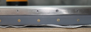 The aft half of the frame is riveted using CS4-4 blind rivets.