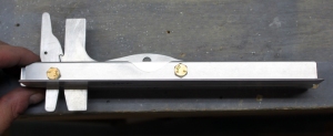 A top view of the assembled latch.  The large hole is partially covered by a spacer which won't be there in the final product.
